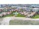 Aerial view of the condo complex, pool, and beach access at 851 Bayway Blvd # 104, Clearwater Beach, FL 33767