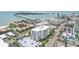 Aerial view of the condo building and surrounding area at 851 Bayway Blvd # 104, Clearwater Beach, FL 33767