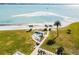 Private beach access with picnic tables and grills for residents at 851 Bayway Blvd # 104, Clearwater Beach, FL 33767