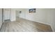 Bright bedroom with mirrored closet and hardwood floors at 851 Bayway Blvd # 104, Clearwater Beach, FL 33767