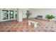 Welcoming condo lobby with seating area and tiled floors at 851 Bayway Blvd # 104, Clearwater Beach, FL 33767