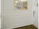 Bright entryway with decorative molding and patterned carpet at 851 Bayway Blvd # 104, Clearwater Beach, FL 33767