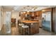 Modern kitchen with granite island and stainless steel appliances at 851 Bayway Blvd # 104, Clearwater Beach, FL 33767