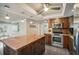 Modern kitchen with stainless steel appliances and granite countertops at 851 Bayway Blvd # 104, Clearwater Beach, FL 33767