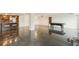 Open floorplan with pool table and kitchen at 851 Bayway Blvd # 104, Clearwater Beach, FL 33767