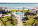 Resort-style pool with lounge chairs, spa and beach access at 851 Bayway Blvd # 104, Clearwater Beach, FL 33767