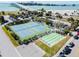 Aerial view of tennis courts and shuffleboard courts near waterfront at 851 Bayway Blvd # 104, Clearwater Beach, FL 33767