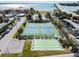 Aerial view of two tennis courts and shuffleboard courts at 851 Bayway Blvd # 104, Clearwater Beach, FL 33767
