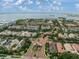 Aerial view of a beautiful community with waterfront access and lush greenery at 6002 Printery St # 103, Tampa, FL 33616