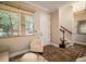 Light and airy entryway with tile flooring and a view to the staircase at 6002 Printery St # 103, Tampa, FL 33616