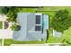 Aerial view showing house, pool, and backyard at 17508 Isbell Ln, Odessa, FL 33556