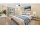 Main bedroom with a king-size bed and neutral decor at 806 Red Ash Ct, Seffner, FL 33584