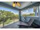 Private balcony with relaxing chaise lounge and beautiful green views at 905 Seagrape Dr, Ruskin, FL 33570