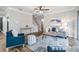 Relaxing living room, featuring a neutral color palette and hardwood floors at 905 Seagrape Dr, Ruskin, FL 33570