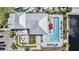 Arial view of resort pool and clubhouse with plenty of lounge chairs at 905 Seagrape Dr, Ruskin, FL 33570