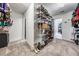 Spacious walk-in closet with custom shelving for ample storage at 905 Seagrape Dr, Ruskin, FL 33570