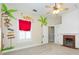 bedroom with a ceiling fan, painted animal murals, bright window, closet, and a beautiful brick fireplace at 14006 5Th St, Dade City, FL 33525