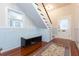 Entryway foyer under staircase featuring seating and hardwood floors at 14006 5Th St, Dade City, FL 33525