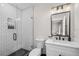Clean bathroom with subway tile shower and floating vanity at 2506 N Highland Ave, Tampa, FL 33602