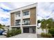 Modern two-story home with attached garage and balcony at 2506 N Highland Ave, Tampa, FL 33602