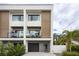 Contemporary two-story townhome with private balcony and driveway at 2506 N Highland Ave, Tampa, FL 33602