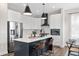 Modern kitchen with stainless steel appliances and white cabinetry at 2506 N Highland Ave, Tampa, FL 33602