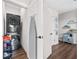Laundry room with LG washer and dryer, and ironing board at 2506 N Highland Ave, Tampa, FL 33602