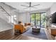 Modern living room with glass wall and access to a private balcony at 2506 N Highland Ave, Tampa, FL 33602
