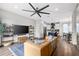 Open-concept living area with modern furnishings and kitchen view at 2506 N Highland Ave, Tampa, FL 33602