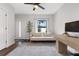 Office space with sofa, desk, and large window at 2506 N Highland Ave, Tampa, FL 33602