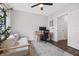 Home office with a comfortable sofa and a workspace at 2506 N Highland Ave, Tampa, FL 33602