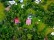 Aerial view of property showing house, pool and surrounding area at 4502 Hill Dr, Valrico, FL 33596