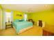 Large bedroom with a king-size bed and a calming color palette at 4502 Hill Dr, Valrico, FL 33596