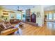 Spacious living room with hardwood floors, fireplace, and comfortable seating at 4502 Hill Dr, Valrico, FL 33596