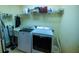 Utility room with central vacuum system and HVAC unit at 4502 Hill Dr, Valrico, FL 33596