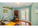 Home office with built-in shelves and access to private balcony at 4502 Hill Dr, Valrico, FL 33596