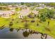 Aerial view showcasing the home's backyard and canal view at 1501 63Rd W St, Bradenton, FL 34209