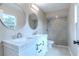 Updated bathroom with double vanity and walk-in shower at 1501 63Rd W St, Bradenton, FL 34209