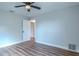 Bright bedroom with hardwood floors and ceiling fan at 1501 63Rd W St, Bradenton, FL 34209