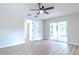Spacious bedroom with sliding glass doors leading to patio at 1501 63Rd W St, Bradenton, FL 34209