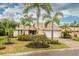 Single-story home with a two-car garage and lush landscaping at 1501 63Rd W St, Bradenton, FL 34209