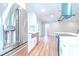 Modern kitchen with stainless steel appliances and white cabinetry at 1501 63Rd W St, Bradenton, FL 34209