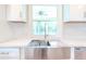 Farmhouse sink with stainless steel and quartz countertops at 1501 63Rd W St, Bradenton, FL 34209