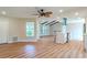 Open living room with vaulted ceiling and wood beams at 1501 63Rd W St, Bradenton, FL 34209