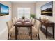 Bright dining room with modern decor, large windows and a stylish rug perfect for dinner parties at 4838 Sevilla Shores Dr, Wimauma, FL 33598