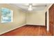 Bedroom with hardwood floors and double door closet at 731 E Lumsden Rd, Brandon, FL 33511