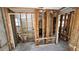 Bathroom view shows the framework during remodeling with the toilet, sink, and shower intact at 6138 Island Dr, Weeki Wachee, FL 34607