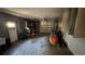 The spacious garage features lighting and is ready for storage and vehicles at 6138 Island Dr, Weeki Wachee, FL 34607