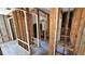 Spacious interior view shows the framework during remodeling with updated flooring at 6138 Island Dr, Weeki Wachee, FL 34607