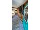 Open-concept interior with wood floors and visible wall framing at 6138 Island Dr, Weeki Wachee, FL 34607